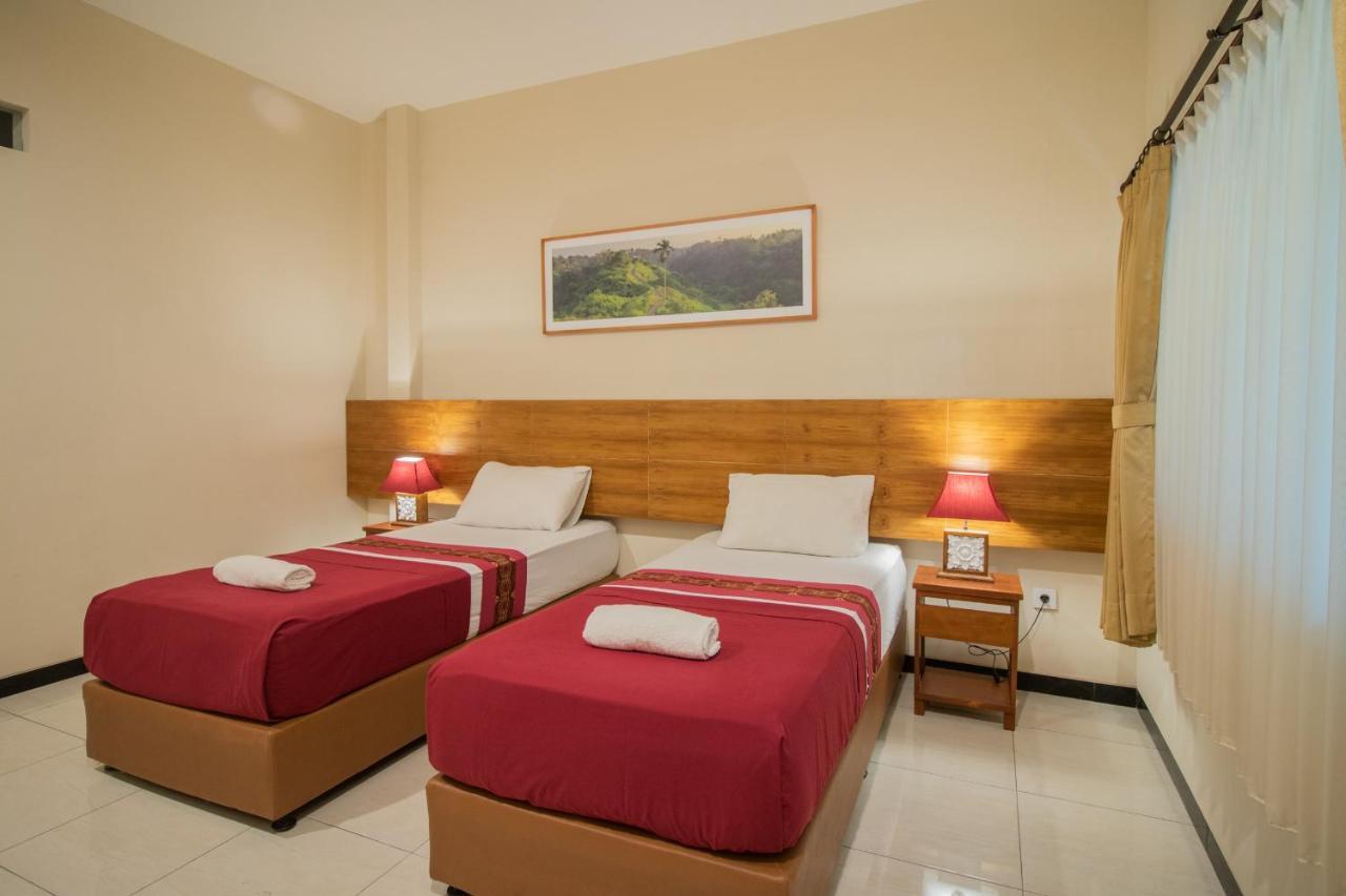 Kuta Suci Guesthouse المظهر الخارجي الصورة