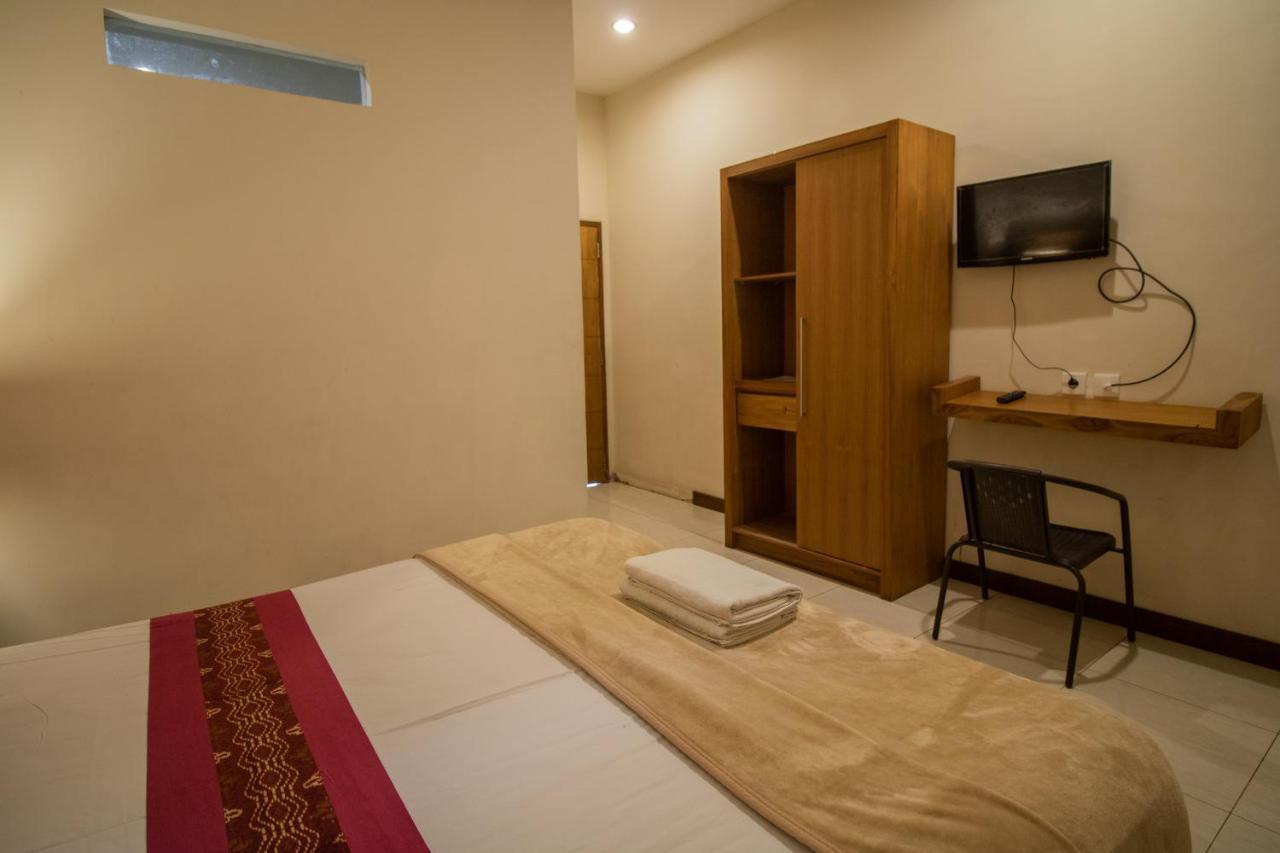 Kuta Suci Guesthouse المظهر الخارجي الصورة