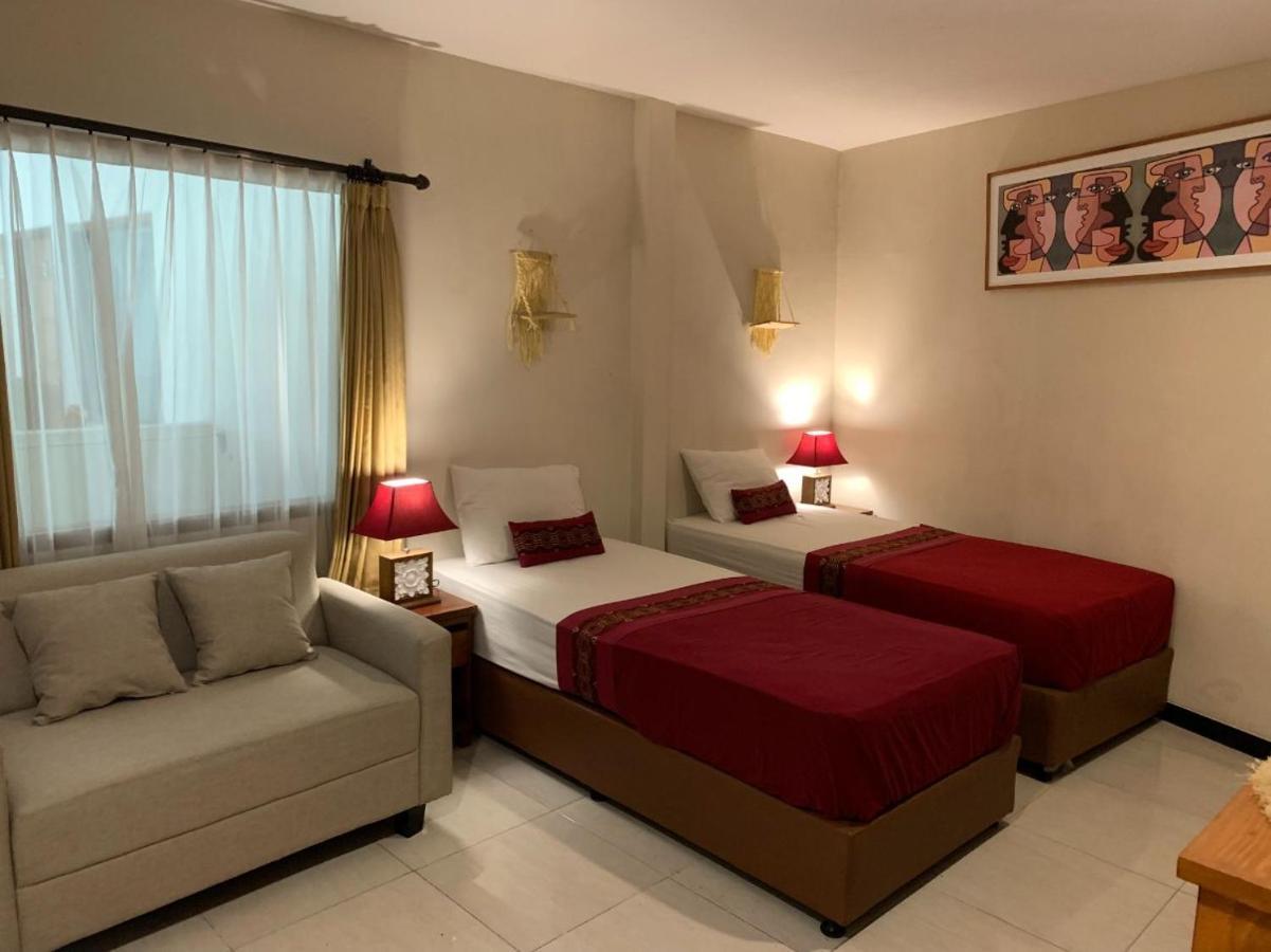 Kuta Suci Guesthouse المظهر الخارجي الصورة