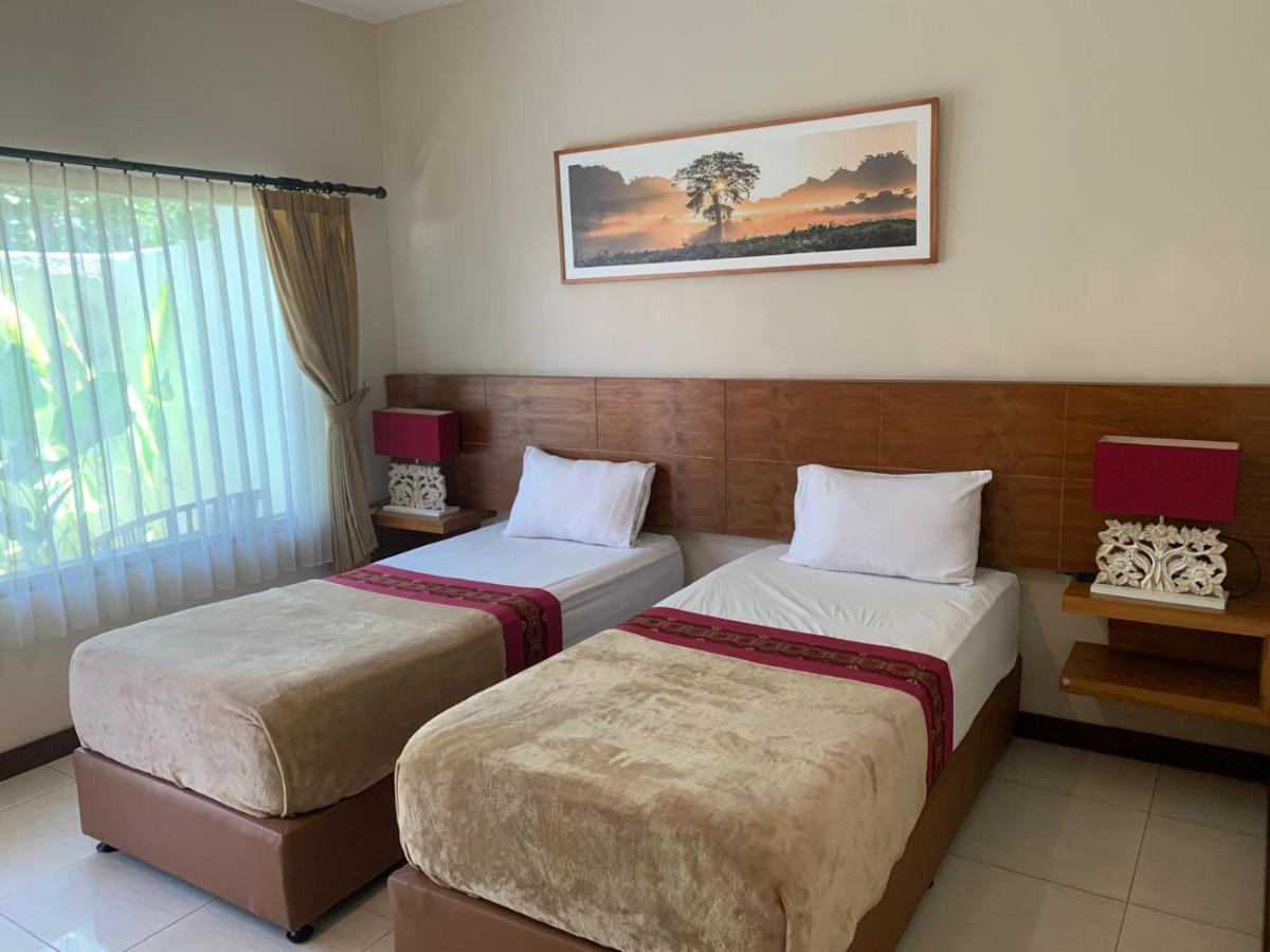 Kuta Suci Guesthouse المظهر الخارجي الصورة