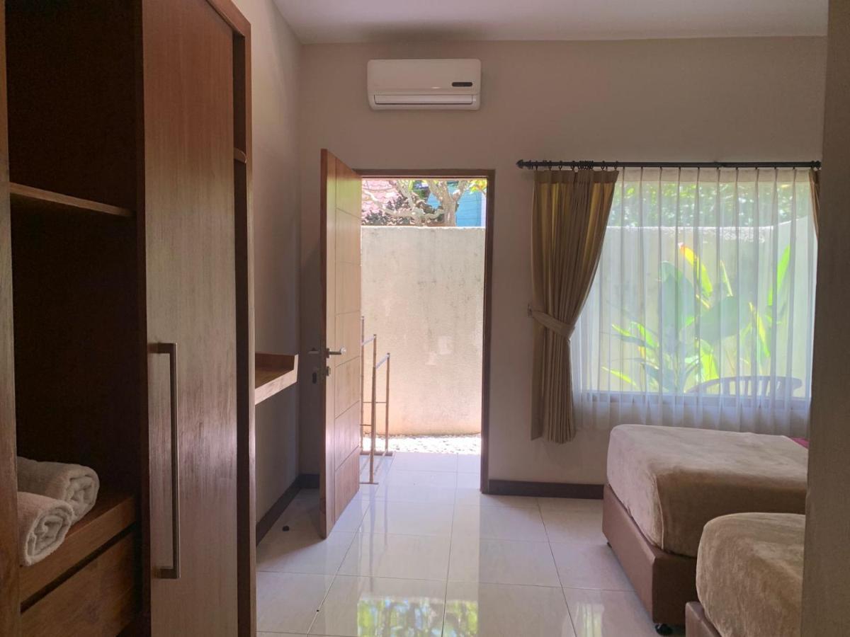 Kuta Suci Guesthouse المظهر الخارجي الصورة